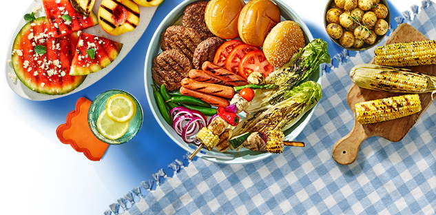 Grilled watermelon and peaches, ice cold lemonade, platter of flame grilled burgers, hots dogs, kabobs with charred lettuce, corn and garlic and herb potatoes. 