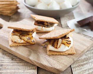 Pineapple smore on wooded board on table