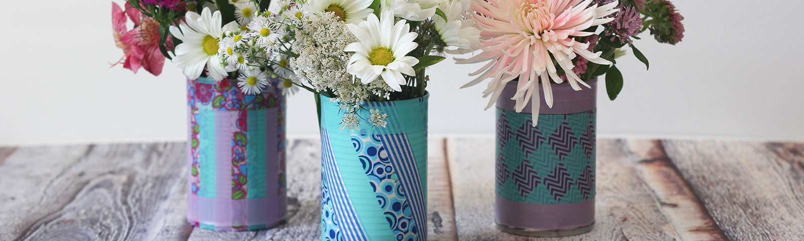 Flowers in tin cans