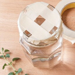 use strips of masking tape to make a square grid across the opening