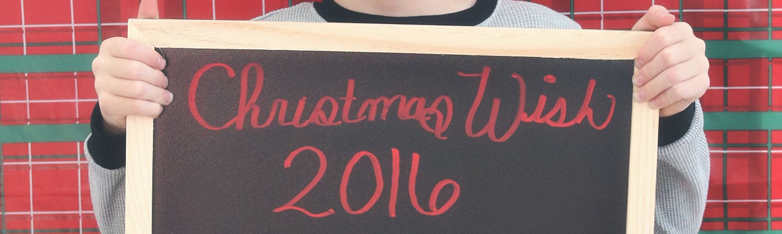 Kid holding sign for picture