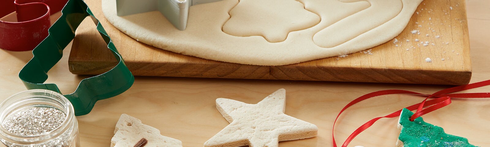 Rolling pin and cookie cutters with finished painted ornaments
