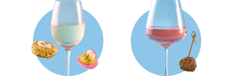 Glass of Sauvignon Blanc with mini crab cakes and pastel deviled eggs. Glass of Rosé with lamb meatballs