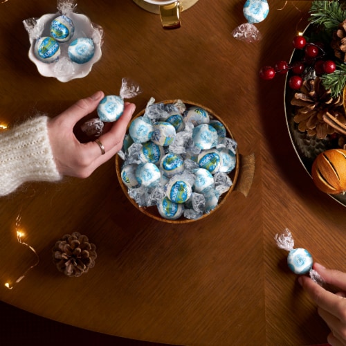 Lindt LINDOR Snowman Milk with White Milk Chocolate Christmas Candy Truffles Bag Perspective: back