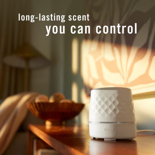 Febreze PLUG Scent Booster Continuous Scent Device Oil Diffuser Perspective: back