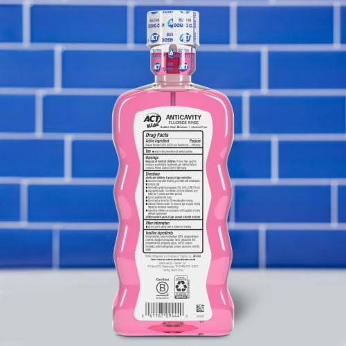 ACT Anticavity Fluoride Mouthwash for Kids Sugar & Alcohol Free Bubble Gum Blowout Flavor Perspective: back