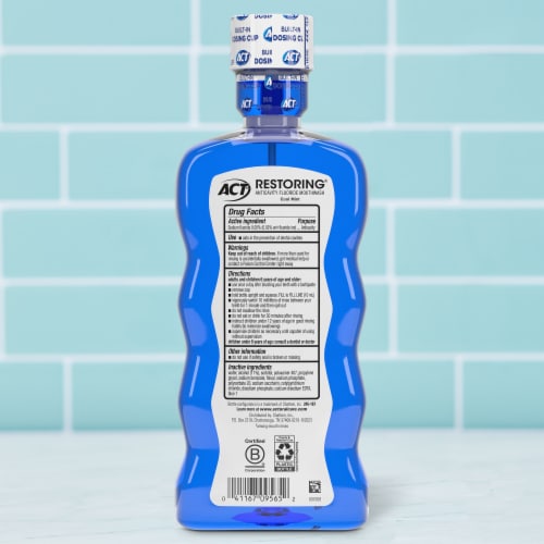 ACT Restoring Anticavity Fluoride With Alcohol Cool Mint Mouthwash Perspective: back