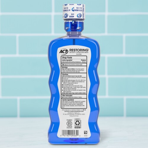 ACT Restoring Anticavity Fluoride Mouthwash with Zero Alcohol Cool Mint Perspective: back