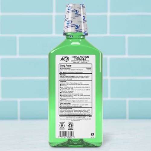 ACT Total Care Anticavity Fluoride Mouthwash with Zero Alcohol Fresh Mint Perspective: back