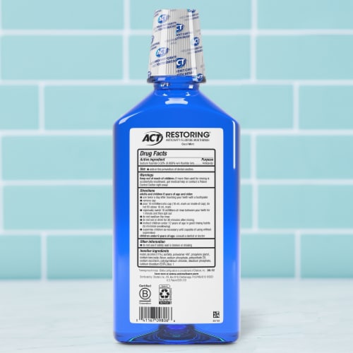ACT Restoring Anticavity Fluoride With Alcohol Cool Mint Mouthwash Perspective: back