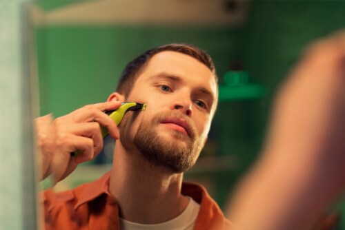 Philips Norelco Rechargable OneBlade Face + Body Trimmer and Shaver Perspective: back