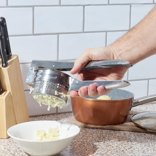 Hand held potato shop ricer