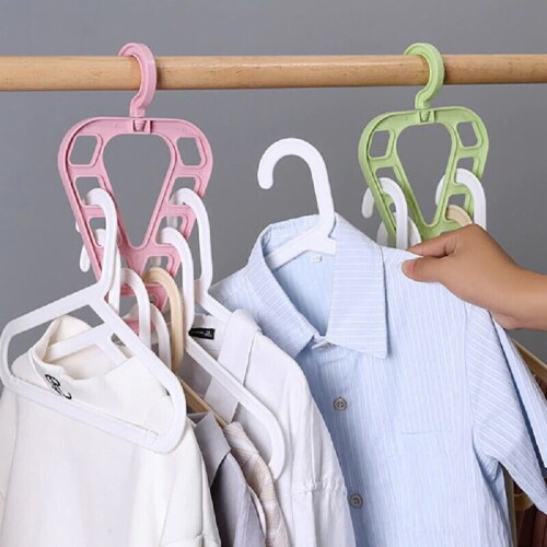 1pc 9-hole Rotating Magic Clothes Hanger For Storage And