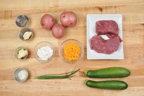 Home Chef Meal Kit Steak With Garlic-Herb Butter And Buttermilk-Cheddar Mashed Potatoes & Zucchini Perspective: back