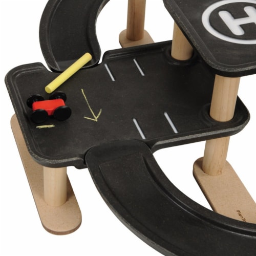 Plan toys race n play top