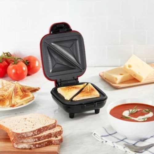 Dash® Pocket Sandwich Maker in Red Perspective: bottom