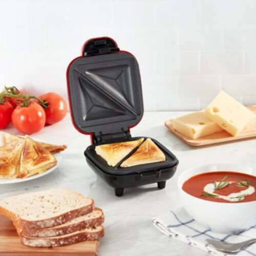 Dash® Pocket Sandwich Maker in Red Perspective: bottom