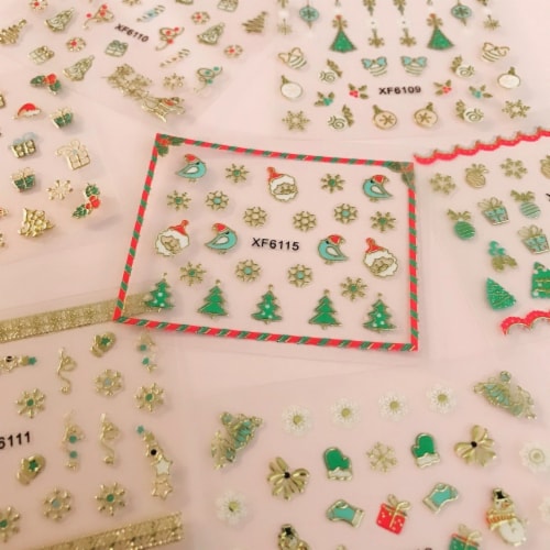 Wrapables 1200+ Festive Holiday Nail Stickers Christmas Nail Art Stickers (50 sheets) Perspective: bottom