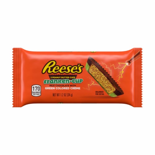 REESE'S Milk Chocolate Peanut Butter Cups Green Colored Creme Franken-Cups Halloween Candy Perspective: front