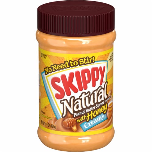 Skippy® Natural Creamy Peanut Butter Spread with Honey Perspective: front
