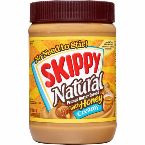 Skippy® Natural Creamy Peanut Butter Spread with Honey Perspective: front