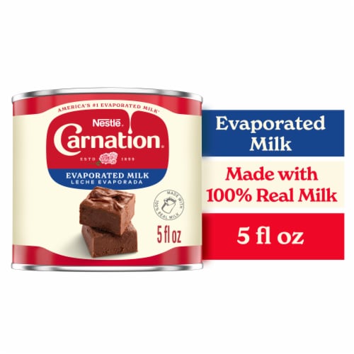 Nestlé Carnation Evaporated Milk Vitamin D Added Shelf Milk Evaporated Milk Canned Perspective: front