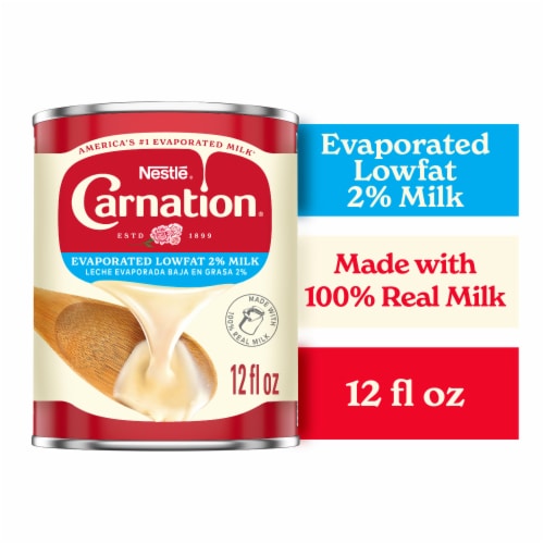 Nestlé Carnation Evaporated Lowfat 2% Milk Vitamin D Added Shelf Milk Evaporated Milk Canned Perspective: front