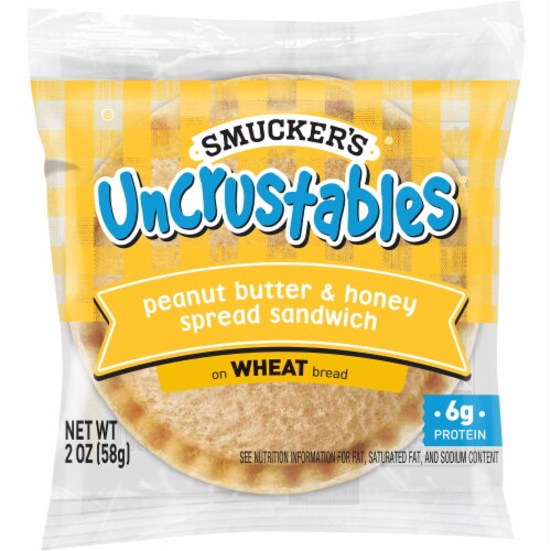 Smucker's Uncrustables Peanut Butter and Honey Spread Wheat Bread Sandwich Perspective: front