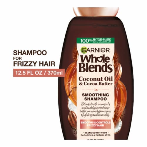 Garnier Whole Blends Coconut Oil and Cocoa Butter Smoothing Shampoo for Frizzy Hair Perspective: front