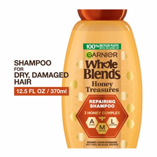 Garnier Whole Blends Honey Treasures Repairing Shampoo for Dry, Damaged Hair Perspective: front