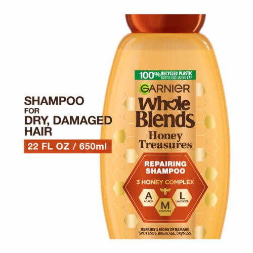Garnier Whole Blends Honey Treasures Repairing Shampoo for Dry, Damaged Hair Perspective: front