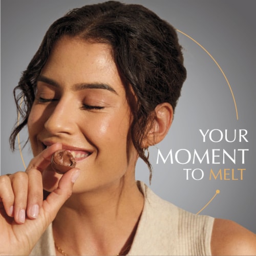 Lindt LINDOR Milk Assorted Chocolate Candy Truffles Bag Perspective: left
