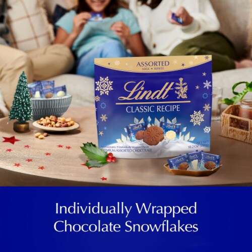 Lindt CLASSIC RECIPE Assorted Chocolate Candy Snowflakes Pouch Perspective: left