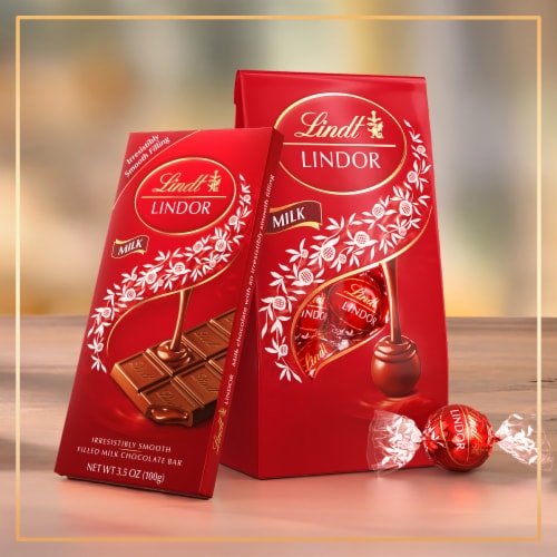 Lindt LINDOR Milk Chocolate Candy Truffle Bar Perspective: left