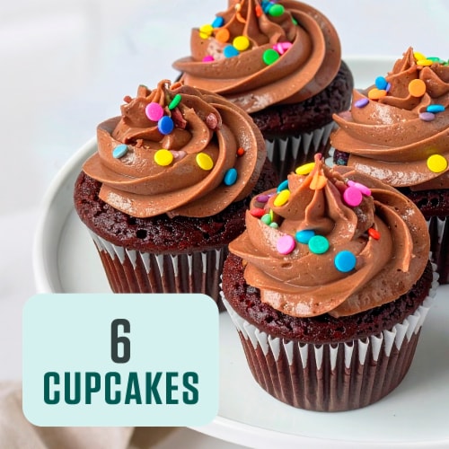 Bakery Fresh Chocolate Cupcakes with Whipped Icing Perspective: left