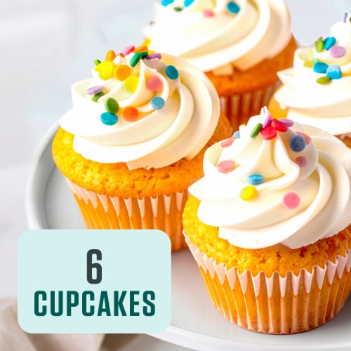 Bakery Fresh Vanilla Cupcakes with Whipped Icing Perspective: left