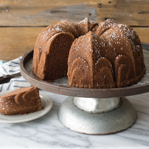 Nordic Ware Non-Stick Cast Aluminum Fleur De Lis Bundt Pan Perspective: left