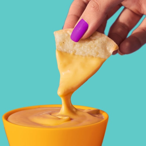 Taco Bell Mild Salsa Con Queso Cheese Dip Perspective: left