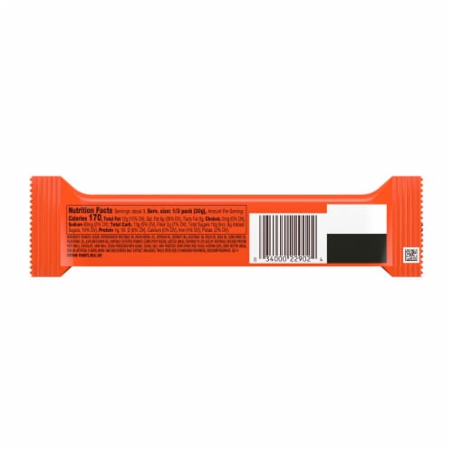 REESE'S Crunchy Peanut Chocolate Peanut Butter and Peanuts King Size Candy Bar Perspective: left