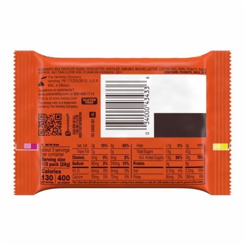 REESE'S Jumbo Cup Milk Chocolate Peanut Butter Cup Candy Pack Perspective: left
