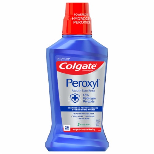Colgate Peroxyl Mouth Sore Mouthwash Oral Rinse Mild Mint Perspective: left