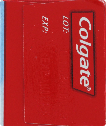 Colgate Triple Action Toothpaste Perspective: left