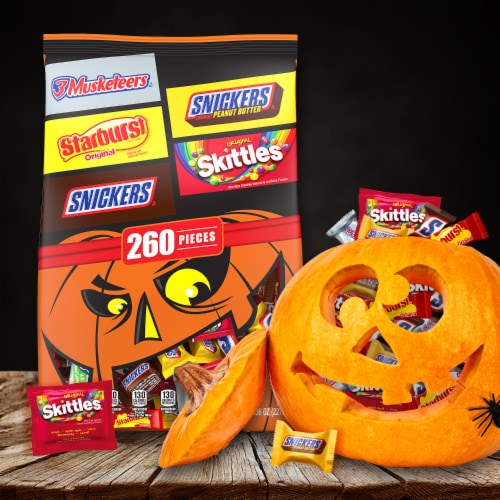 Snickers Skittles Starburst & 3 Musketeers Assorted Bulk Halloween Candy Variety Pack Perspective: left