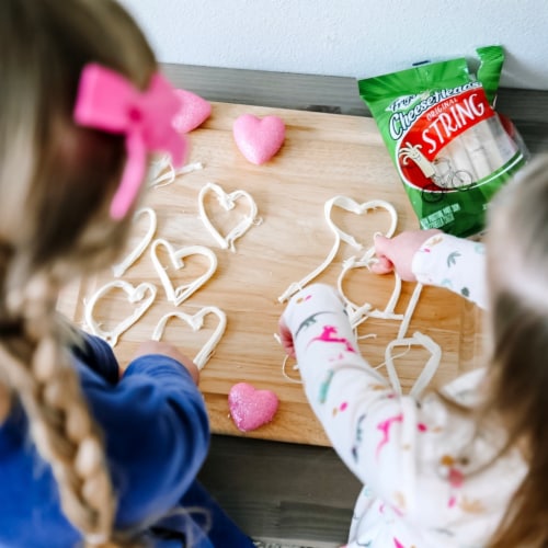 Frigo® Cheese Heads® Original Mozzarella String Cheese Snacks Perspective: left