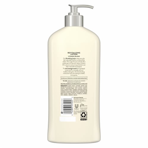 Suave Skin Solutions Revitalizing with Vitamin E Body Lotion Perspective: left