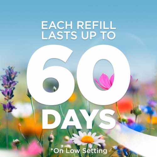 Air Wick Plug in Scented Oil Refill Fresh Linen Air Freshener Essential Oils Perspective: left