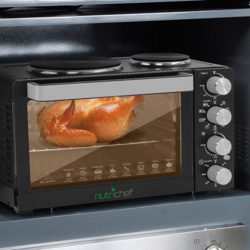 NutriChef PKRTO28 Kitchen Countertop Convection Oven Cooker with Warming Plates Perspective: left