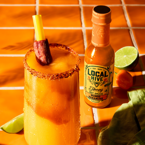 Local Hive™ Mango Honey Hot Sauce Perspective: left