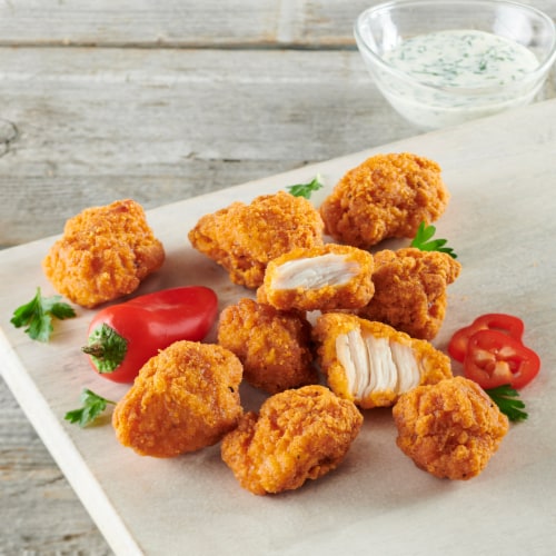 Just Bare® Lightly Breaded Frozen Fully Cooked Spicy Chicken Breast Bites Perspective: left