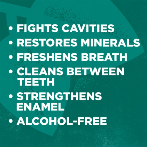 Tom's of Maine Whole Care Natural Fluoride Mouthwash Fresh Mint Perspective: left